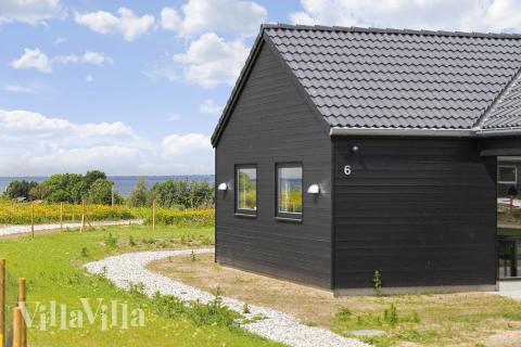 Det vackra området Fyn och öar bjuder in till en vistelse i lyxhus nummer 932.