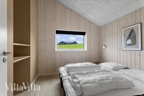 Ett av de 6 utmärkta sovrummen i lyxstuga nr 947 i Vestjylland.