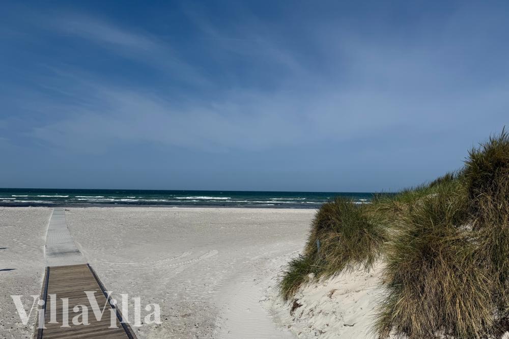 Stranden i närheten av lyxhus 961.