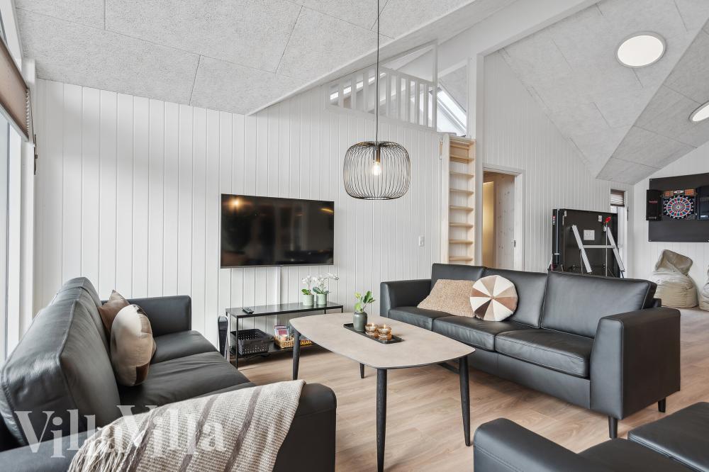 Tävla i sommarhusets aktivitetsrum när ni besöker lyxhus nr 966 i Lolland/Falster/Møn.