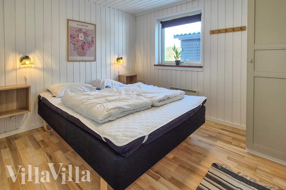 Ett av de 4 utmärkta sovrummen i lyxstuga nr 980 i Østjylland.