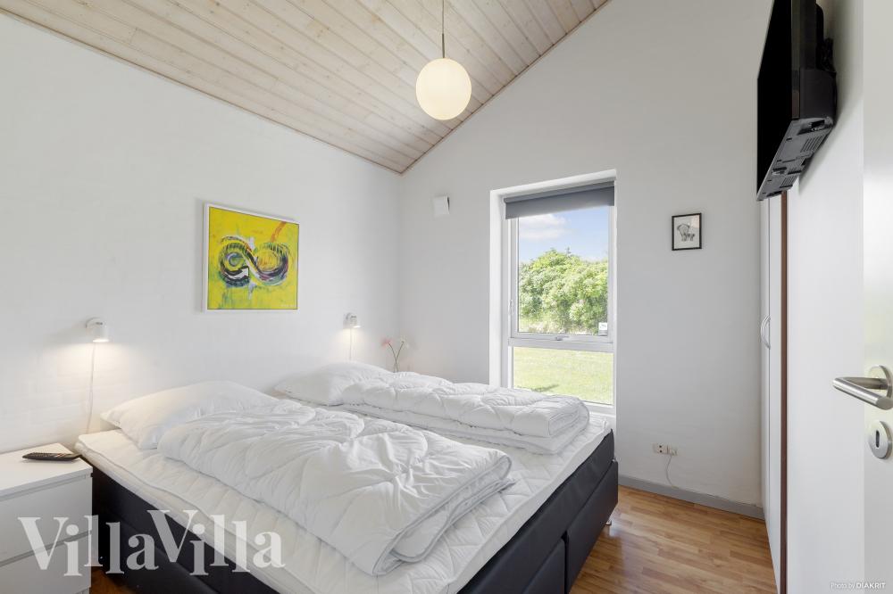 Ett av de 4 utmärkta sovrummen i lyxstuga nr 970 i Vestjylland.