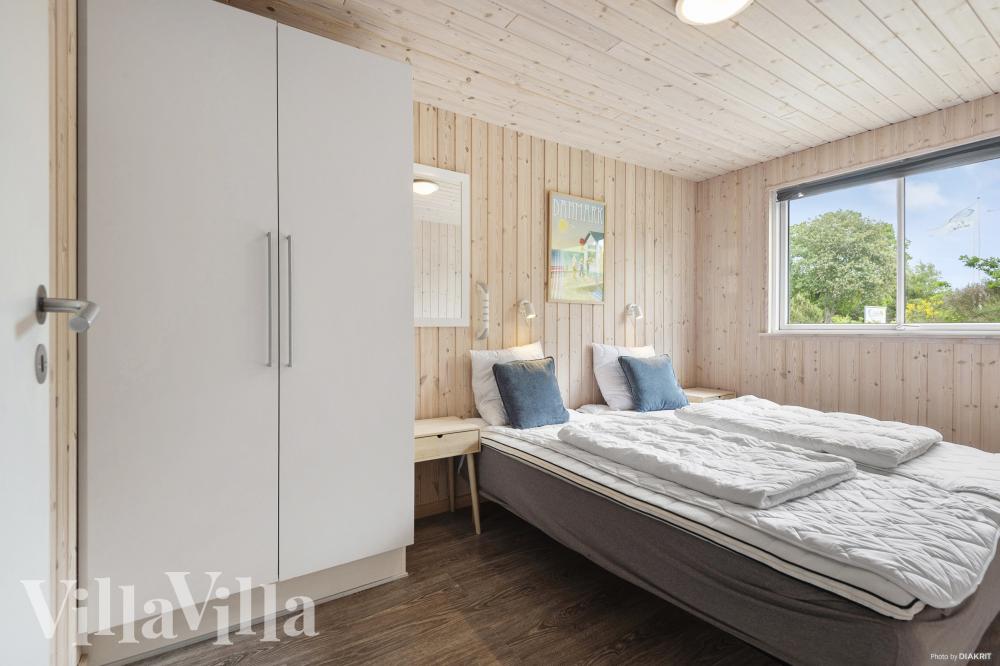 Ett av de 7 utmärkta sovrummen i lyxstuga nr 313 i Vestjylland.