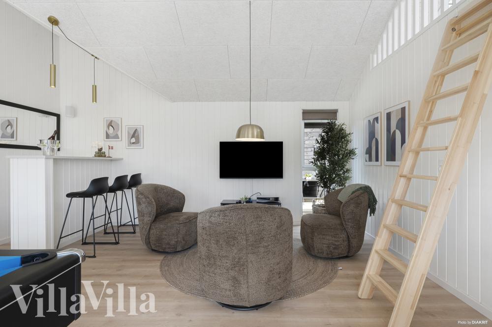 Lyxstuga 915 för 16 personer har ett stort aktivitetsrum med bl.a. biljard och dart