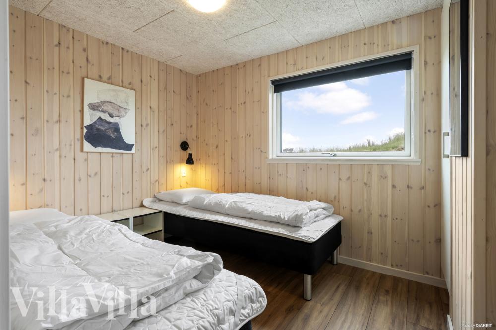 Ett av de 5 utmärkta sovrummen i lyxstuga nr 930 i Vestjylland.