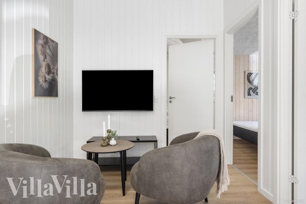 Tävla i sommarhusets aktivitetsrum när ni besöker lyxhus nr 987 i Bornholm.