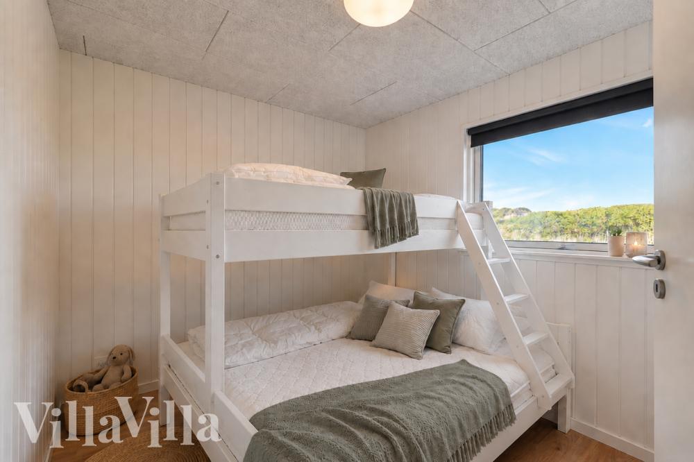 Ett av de 5 utmärkta sovrummen i lyxstuga nr 1000 i Nordjylland.