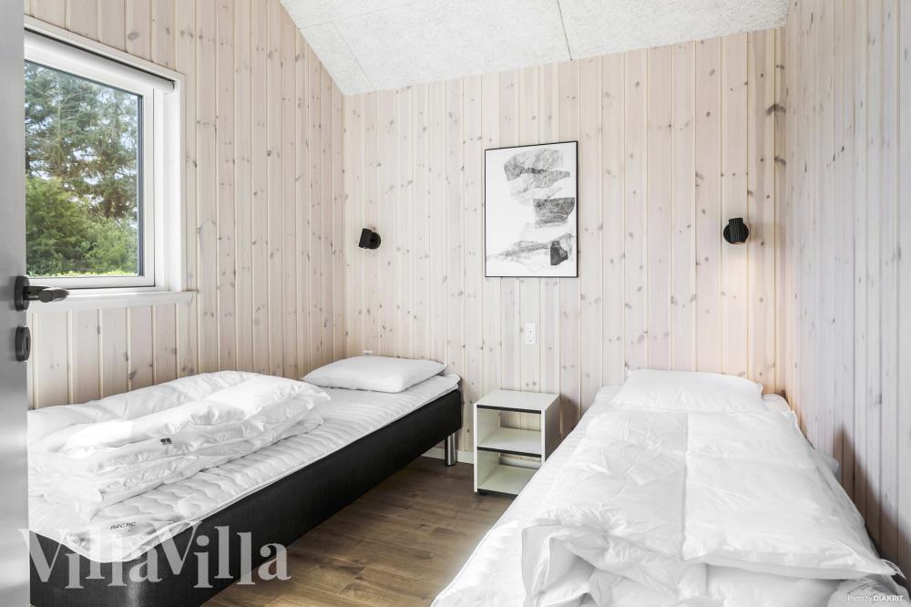 Ett av de 10 utmärkta sovrummen i lyxstuga nr 1001 i Lolland/Falster/Møn.