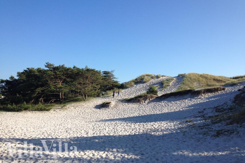 Stranden i närheten av lyxhus 998.