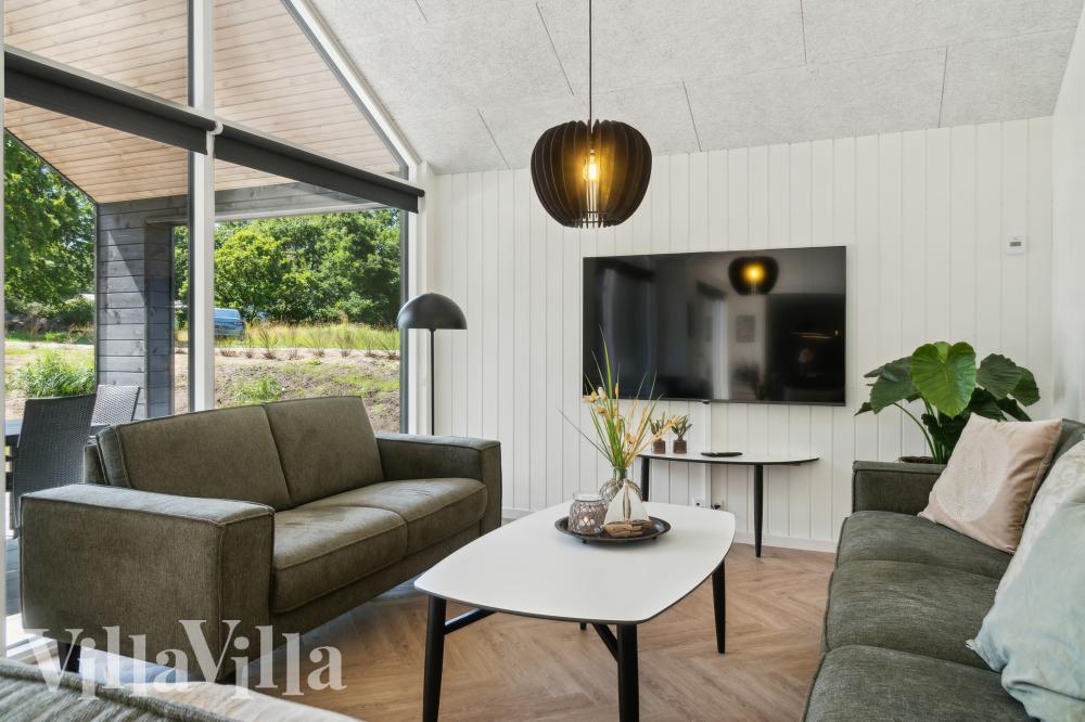 När ni besöker lyxhus nr 999 kan ni mysa tillsammans i sofforna.