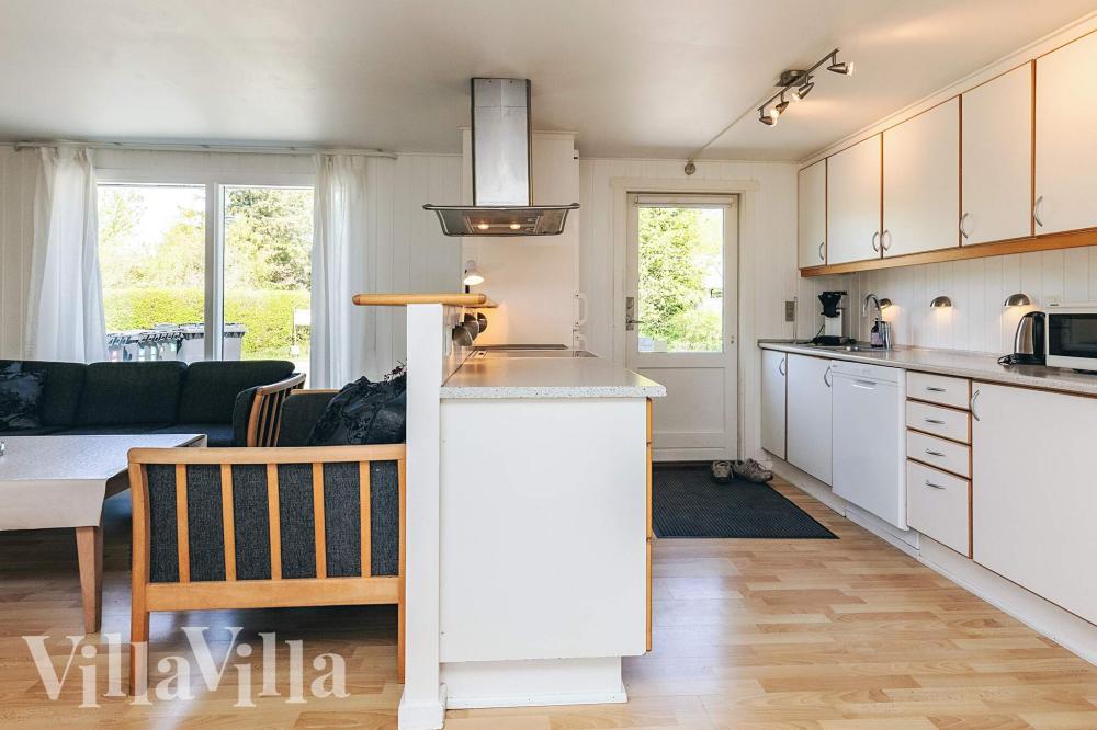 Köket i lyxstuga nr 1003 är utrustat så att ni kan laga mat till 14 personer.