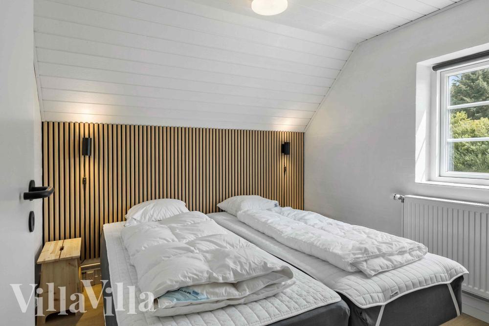 Ett av de 6 utmärkta sovrummen i lyxstuga nr 1005 i Vestjylland.