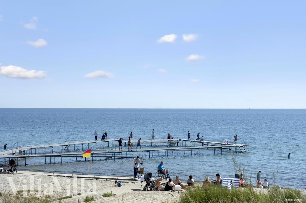 Stranden i närheten av lyxhus 911.