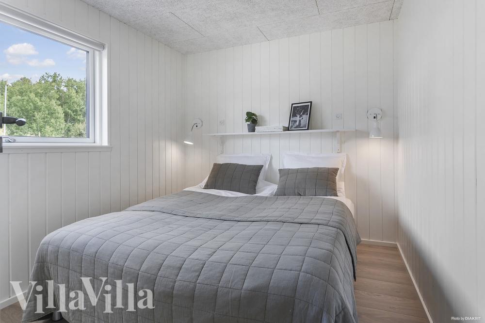 Ett av de 7 utmärkta sovrummen i lyxstuga nr 960 i Lolland/Falster/Møn.