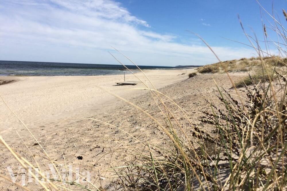 Stranden i närheten av lyxhus 406.