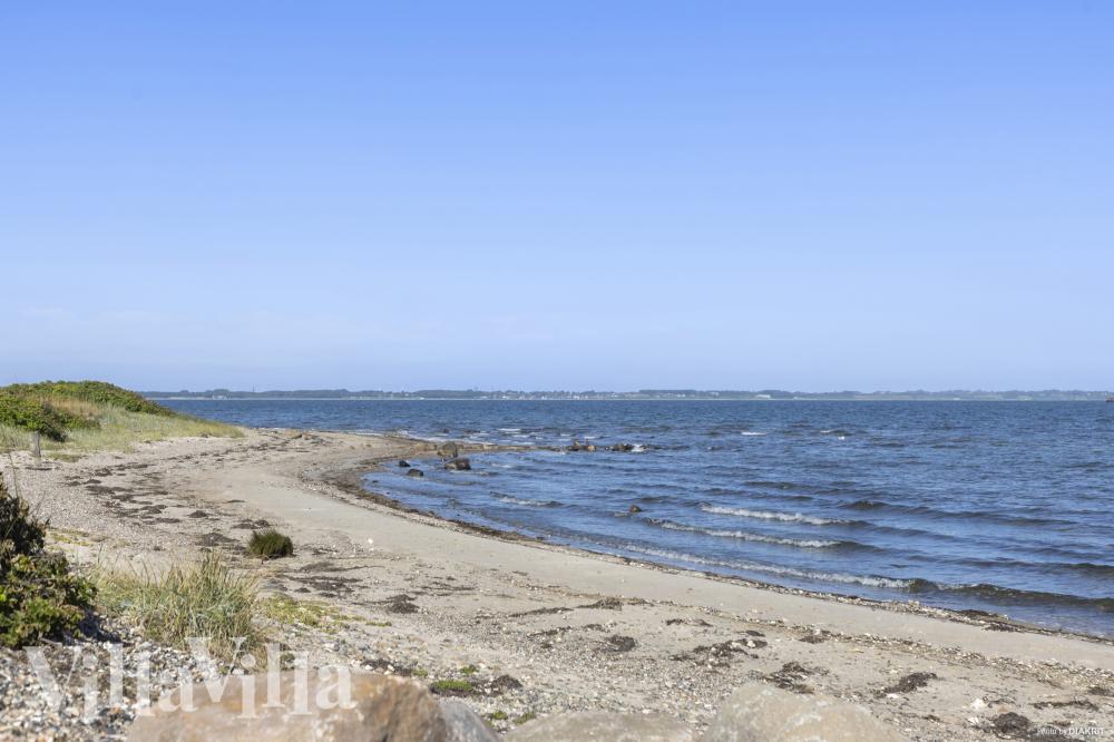 Stranden i närheten av lyxhus 1009.