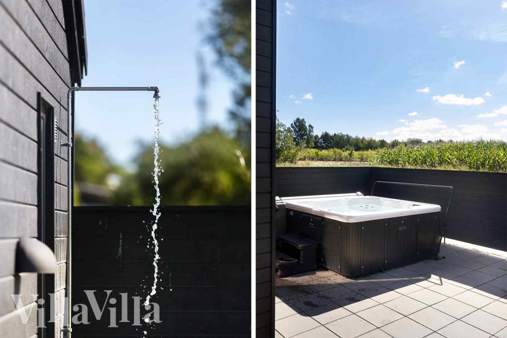 Njut av spabadets värme i lyxstuga nr 997 i Nordsjälland