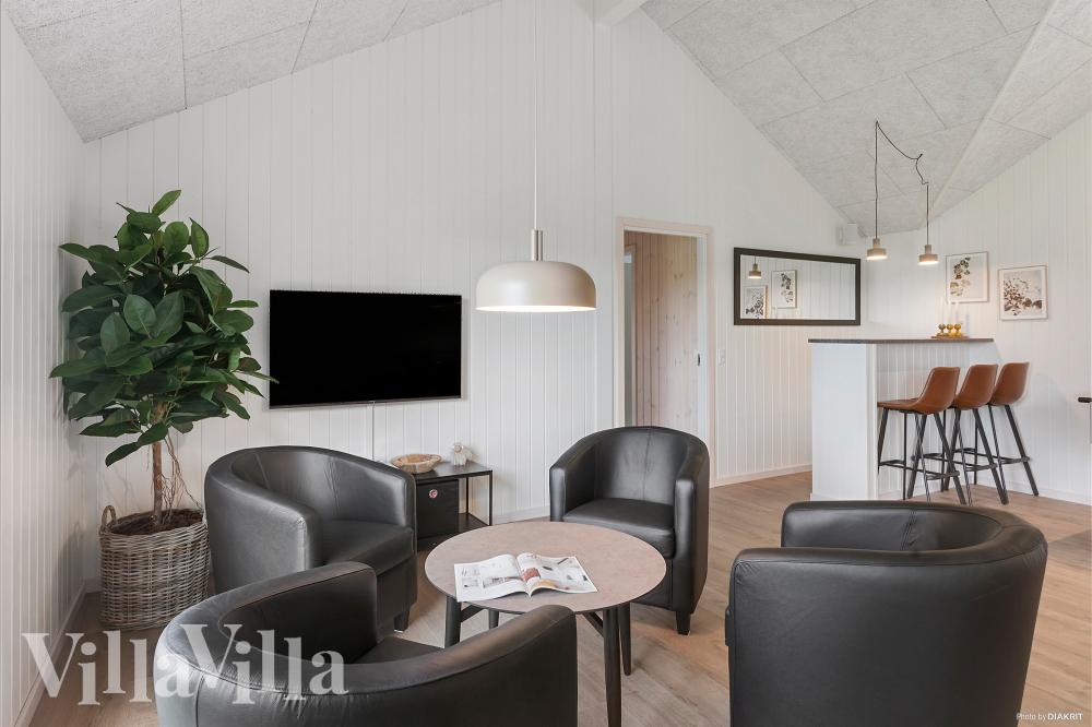 Tävla i sommarhusets aktivitetsrum när ni besöker lyxhus nr 962 i Lolland/Falster/Møn.