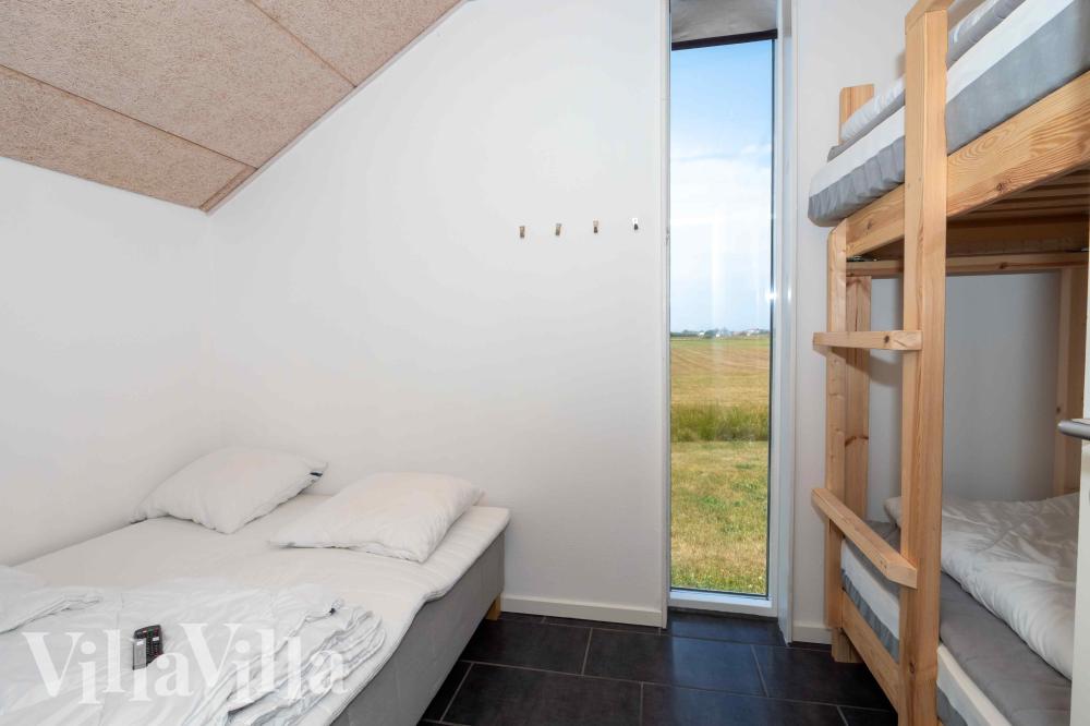Ett av de 10 utmärkta sovrummen i lyxstuga nr 637 i Nordjylland.