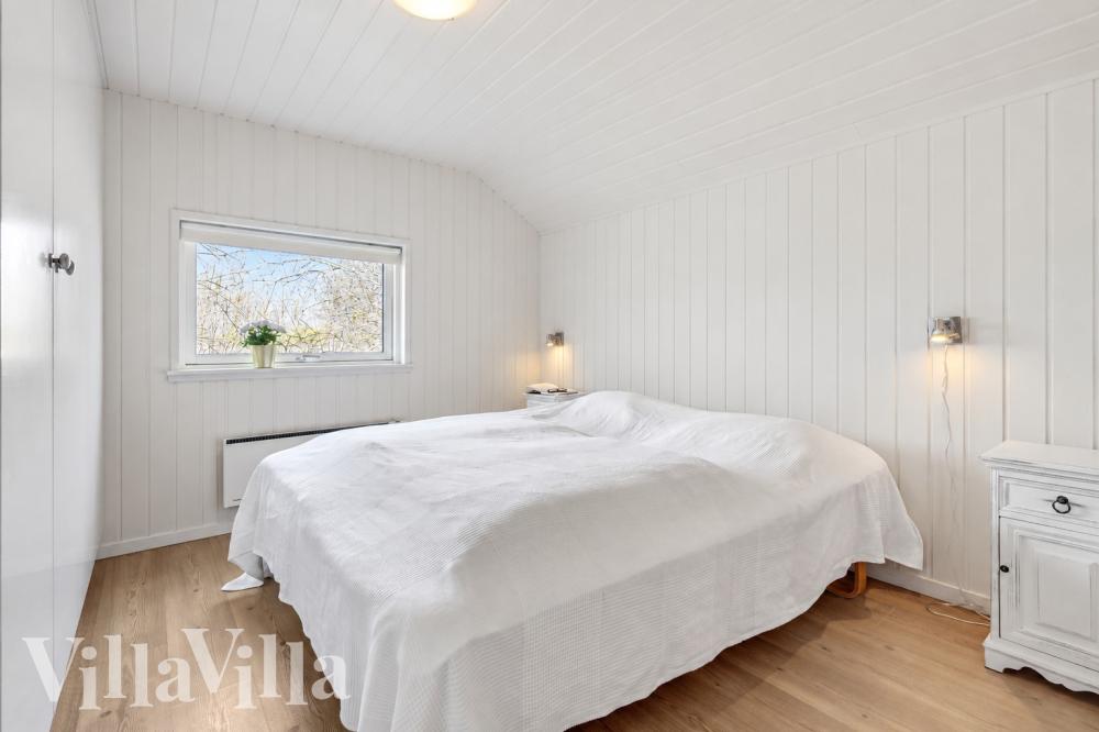 Ett av de 6 utmärkta sovrummen i lyxstuga nr 1004 i Lolland/Falster/Møn.
