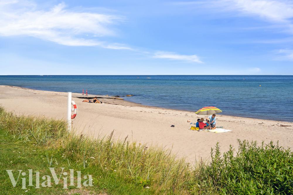 Stranden i närheten av lyxhus 1027.