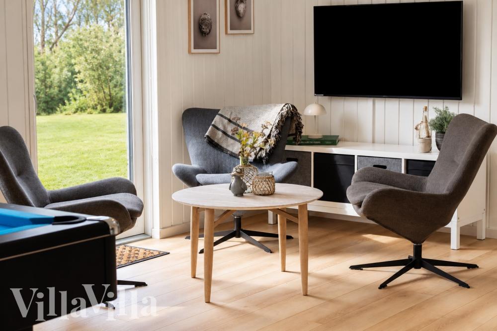 Aktivitetsrum i lyxstuga nr 1021 med 7 sovrum och plats för 20 personer.