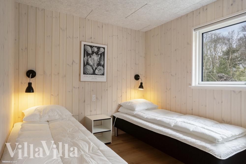 Ett av de 7 utmärkta sovrummen i lyxstuga nr 1021 i Lolland/Falster/Møn.