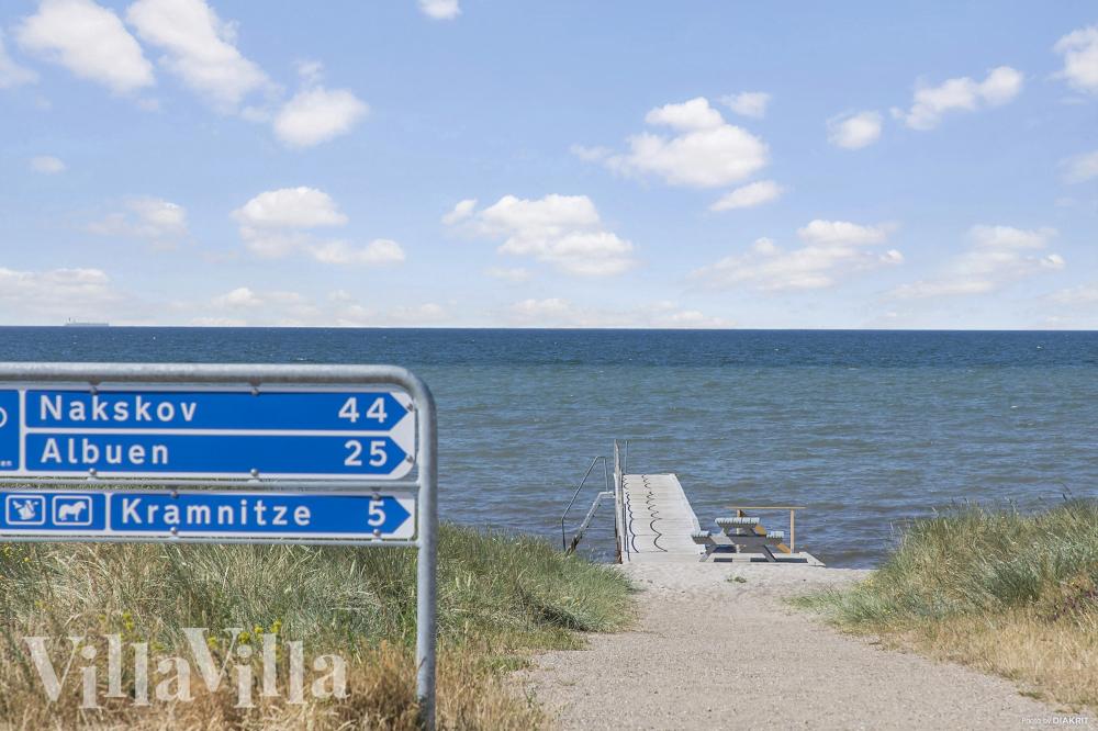 Stranden i närheten av lyxhus 1021.